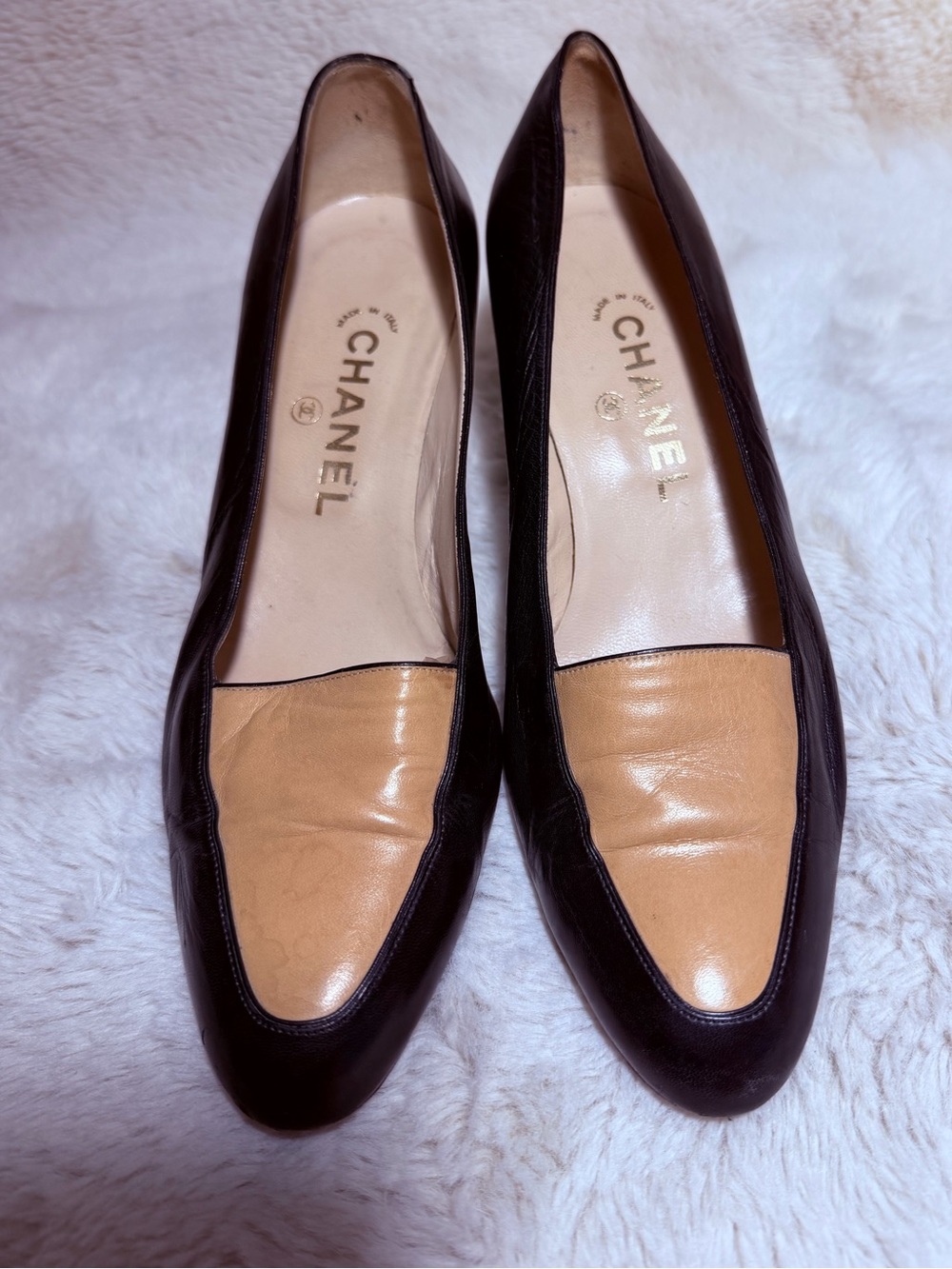 CHANEL Two-Tone Leather Loafers in Black and Tan
